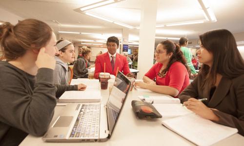 Students meeting with an advisor